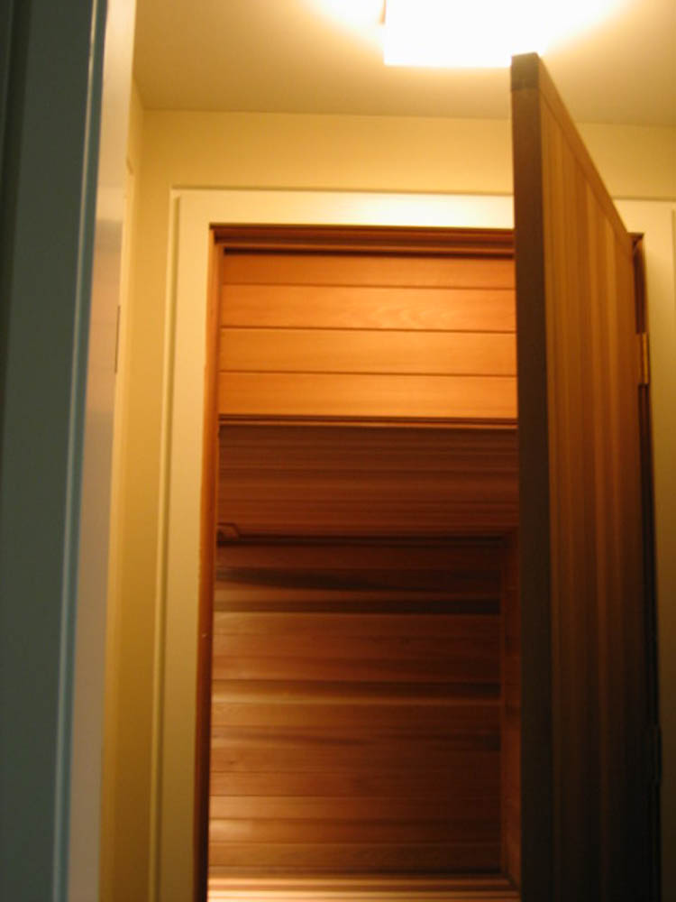 Tall door with cedar trimmed bulkhead