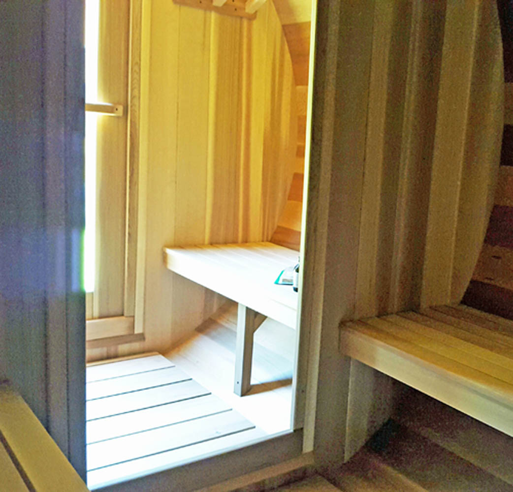 Barrel sauna with changeroom seats