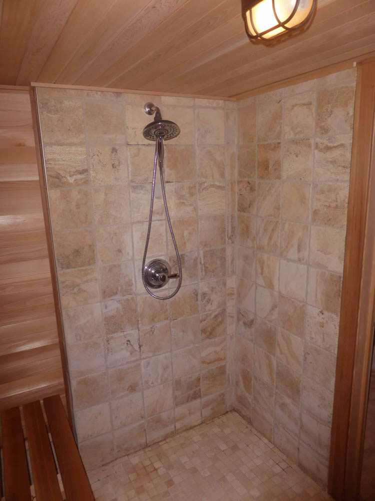 Shower in indoor sauna