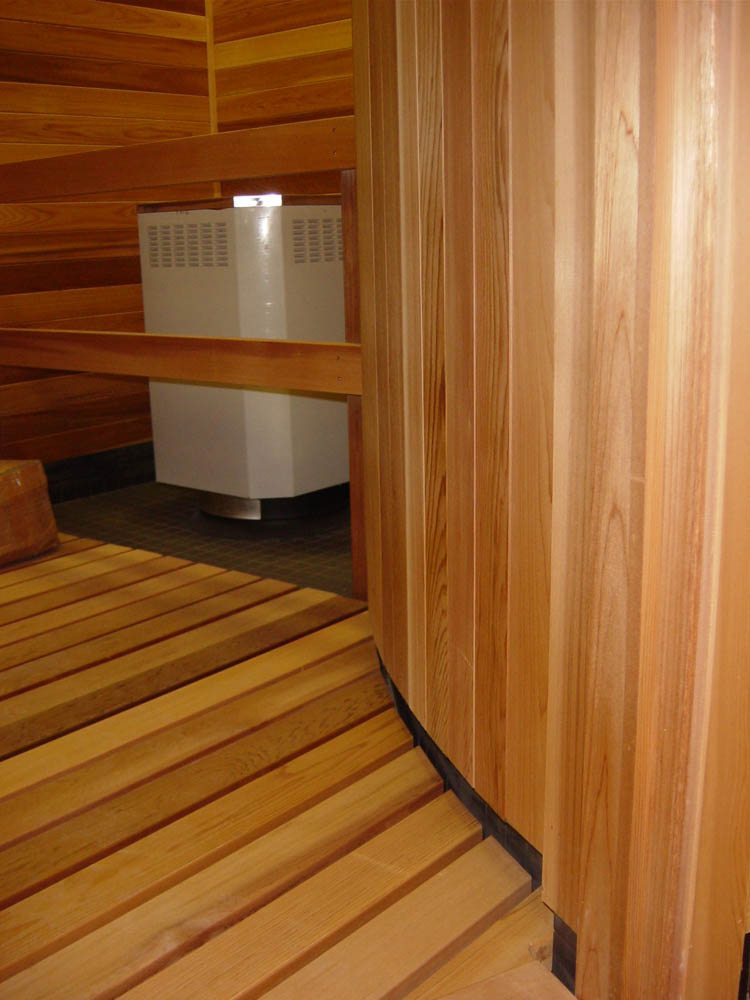 Rounded cedar wall barrel sauna