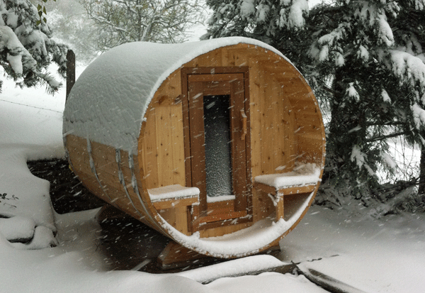 Barrel sauna in snow