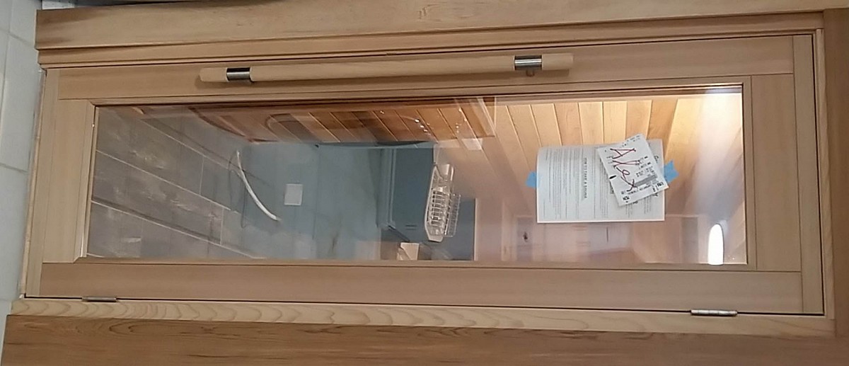 Indoor sauna door with Sawo shower handle