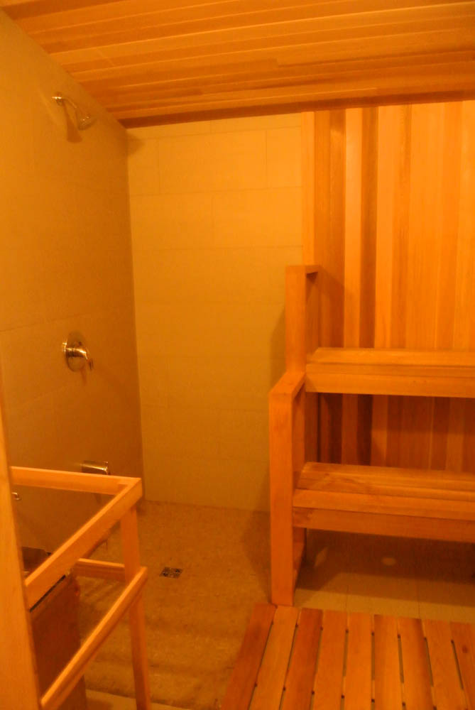 Shower in indoor home sauna