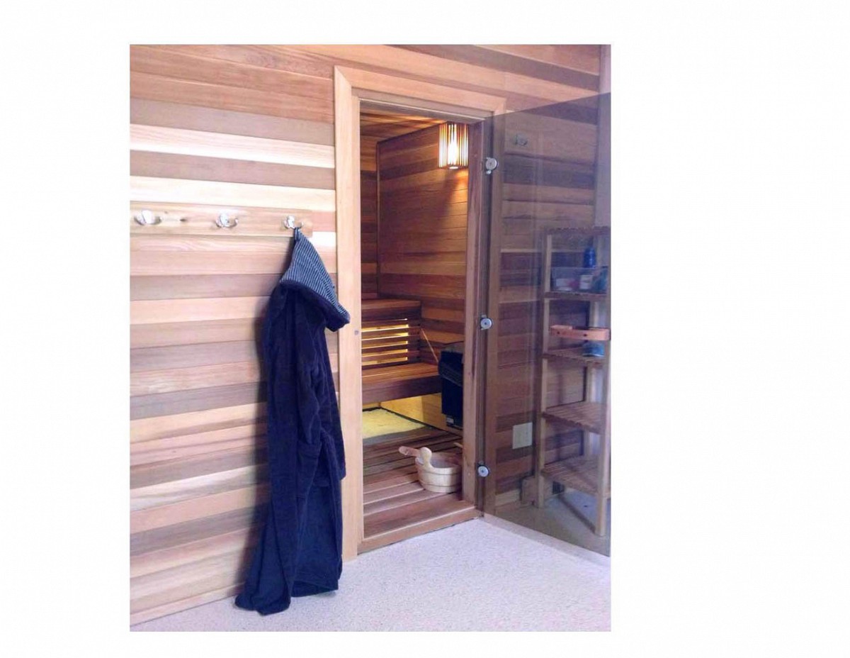 Home sauna with glass door