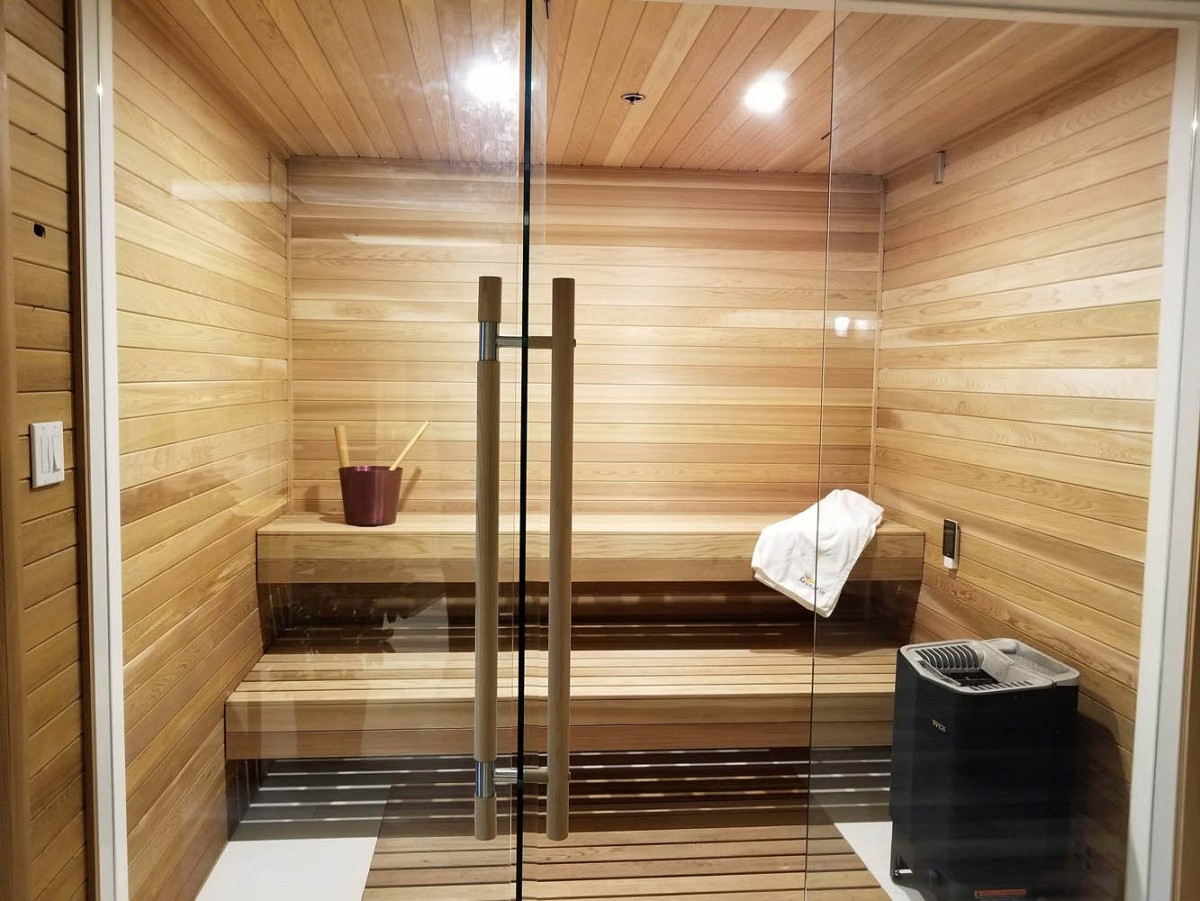 Sauna floating bench, glass wall, recessed light