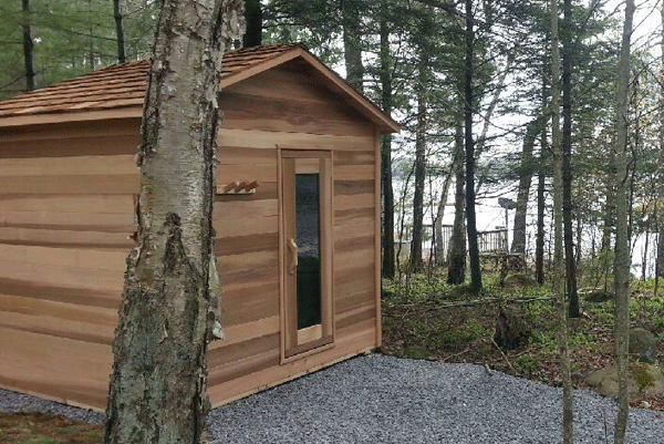 outdoor cabin sauna with glass door