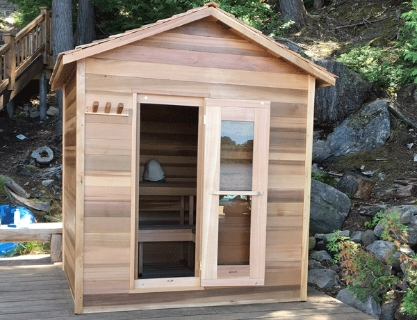 outdoor cabin sauna with bench